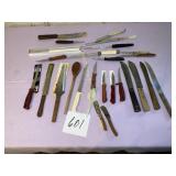 Misc. Knives and 1 wooden spoon