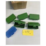 6 empty 9mm-.380 cases,