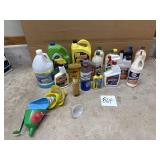 Lot of partial oil bottles, funnels, washer, etc.