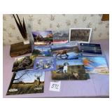 Old wooden box, calendars, feathers
