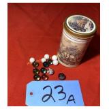 Tin with a few marbles