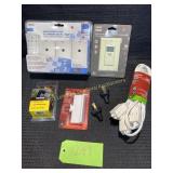 Box of Extension cords, Wireless outlets, etc.