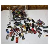 Wire basket of Vintage Hot Wheels cars