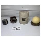 2 pottery pots, 1 round candle with base, stone
