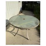 Round patio table with glass top 29" tall 42" wide