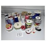 Box of various ribbon some tulle, some metallic,