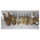 10 Jute wrapped decorative wine bottles, 7 clear