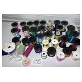 Box of ribbon various sizes, colors, and patterns