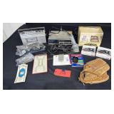 GE cassette player, cell phone and chargers, tv