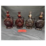 4 Wheaton bottles, 2 Ruby red color, 1 purple, 1