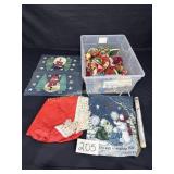 Clear tote of Christmas ornaments, flags and