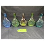 5 Wheaton bottles