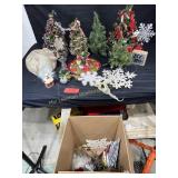Christmas lot, several small trees, snowflakes,