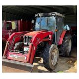 Massey Ferguson tractor and balers, hay trailers, farm implements, a Buick, boat, and tools 