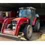 Massey Ferguson tractor and balers, hay trailers, farm implements, a Buick, boat, and tools 