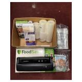 FOOD SAVER SEALER W/EXTRA ROLLS OF BAGS