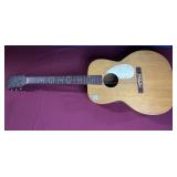 UNMARKED GUITAR (NEEDS A NEW STRING)