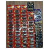 (NEW IN PACKAGES) RACING CHAMPIONS, JOHNNY