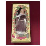 LIMITED COLLECTION PORCELAIN DOLL WITH BENDABLE