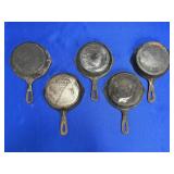 (5) SIDNEY WAGNER CAST IRONS, EACH MEASURES 7"