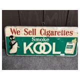 WE SELL CIGARETTES SMOKE KOOL TIN SIGN ON WOOD