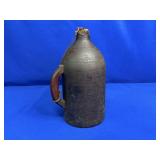 ANTIQUE POWDER FLASK WITH CORK APPROX 12"