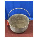 CAST IRON CAULDRON APROX 18.75" WIDE X 10.25" HIGH