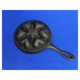 UNMARKED HEART AND STAR CAST IRON BREAD MOLD
