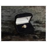 2.5G 10K RING SIZE 7.75 MARKED "XPS" OPAL COLORED