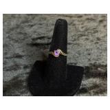 1.4G 10K RING SIZE 7.5 WITH PURPLE STONE