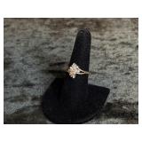 2.6G 10K RING SIZE 8.5 WITH CLEAR STONES