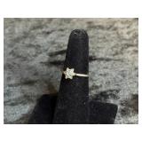 1.9G 14K RING SIZE 5 WITH SNOWFLAKE DESIGN