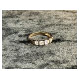 2.1G 14K SIZE 6 RING MARKED "DQ CZ" W/WHITE STONES