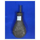 BRASS POWDER FLASK WITH ENGRAVED CANNON