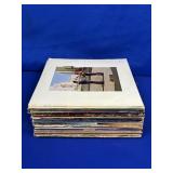 STACK OF VINYL RECORDS: THIN LIZZY, BARRY MANILOWE