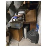 CONTENTS BY BASEMENT STAIRS: DESK, BOOTS, BEACH