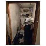 CONTENTS OF BEDROOM CLOSET: HANGERS, WALL DECOR,