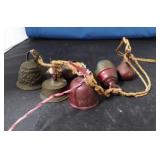 (6) CAST IRON STYLE BELLS ON TWINE