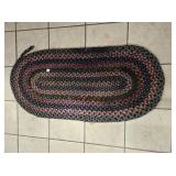 BRAIDED RUG APPROX 48' X 22'