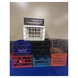 (7) PLASTIC CRATES AND (1) METAL SANI DAIRY MILK