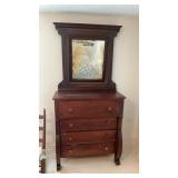 Antique four drawer mirrored dresser