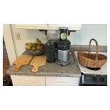 Juicer basket, cutting boards, and decor lot