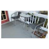 Outdoor table with two chairs