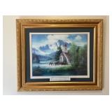 Framed church picture hanging on wall