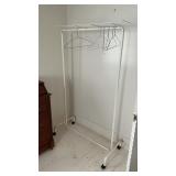 Rolling hanging rack fan and two vacuums