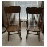 Two wood rocking chairs