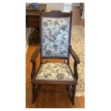 Wooden rocking chair with floral print