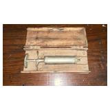 Antique metal syringe with case