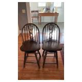 Two swiveling island chairs