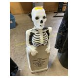 Lighted skeleton w/tombstone
